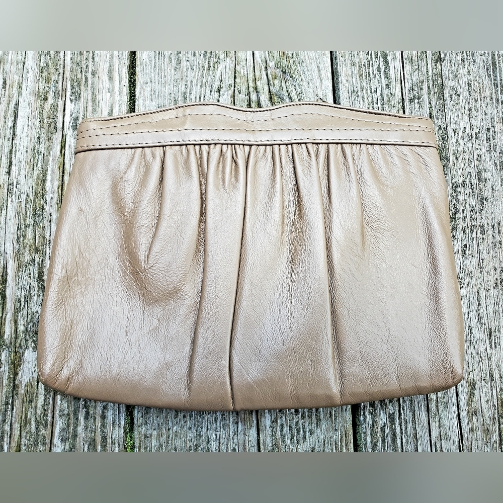 little taupe convertible leather clutch • by andé